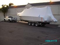 Wrapped boat on a road-ready trailer